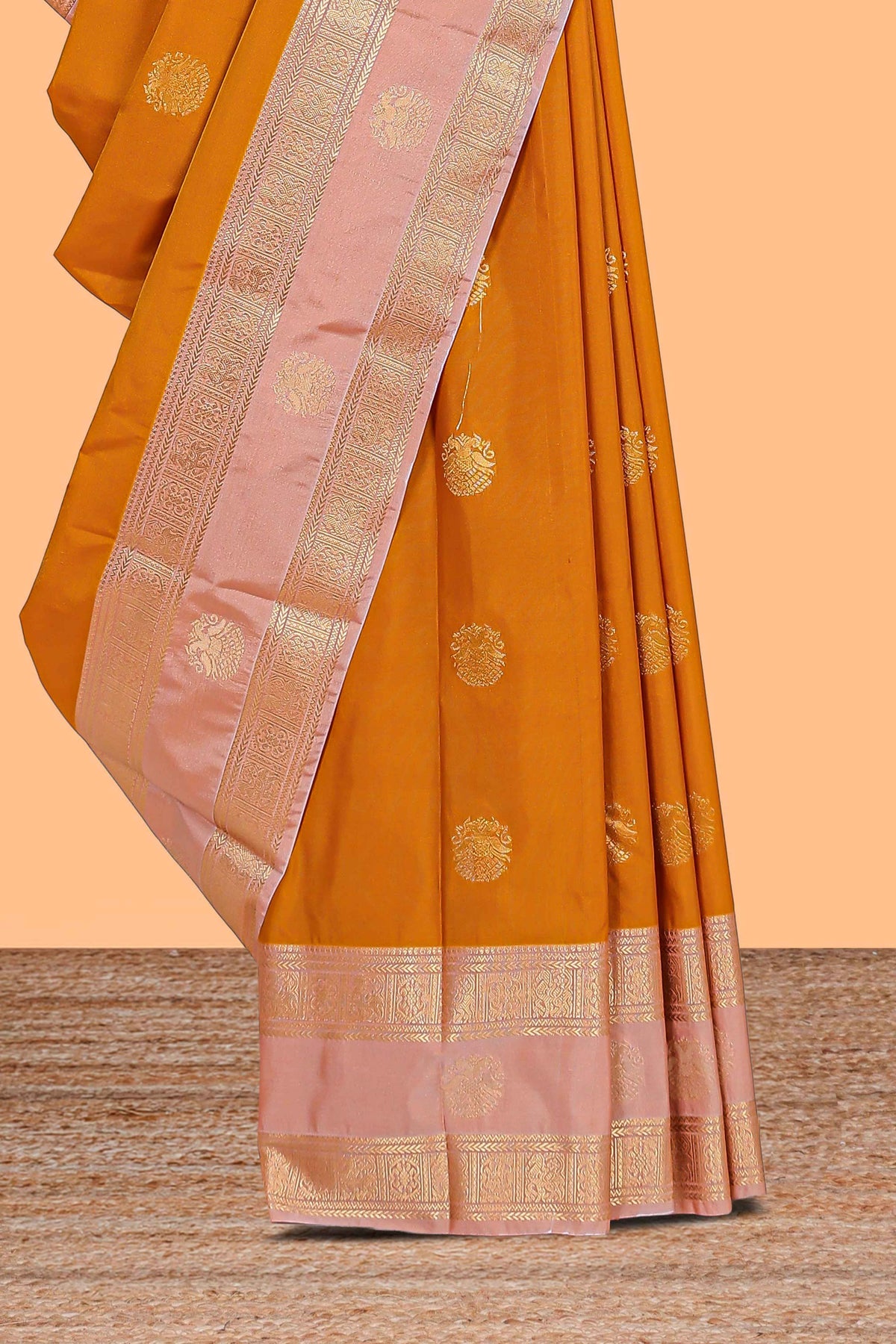 Mustard zari motifs design semi soft silk saree with contrast border and blouse
