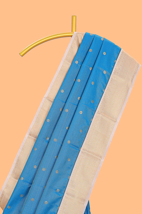 Blue striped floral zari motifs design semi soft silk saree with contrast border and blouse