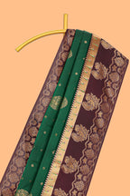 Green zari motifs design semi soft silk saree with contrast border and blouse