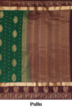 Green zari motifs design semi soft silk saree with contrast border and blouse
