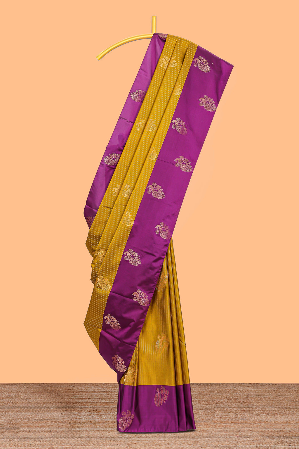 Mustard striped and peacock design semi soft silk saree with contrast border and blouse