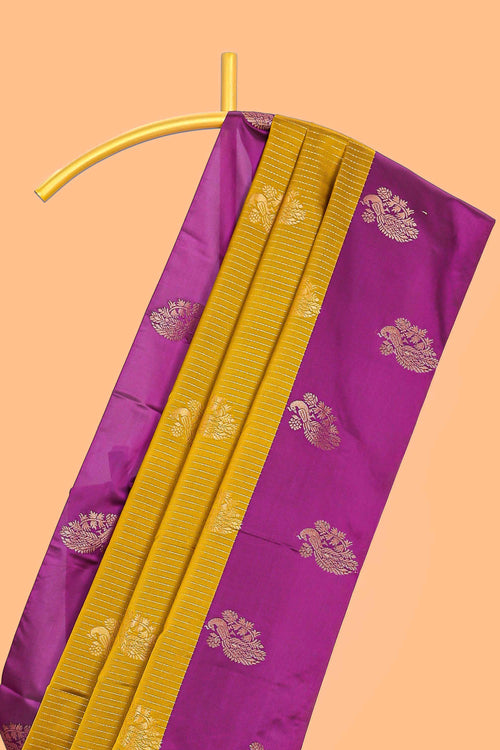 Mustard striped and peacock design semi soft silk saree with contrast border and blouse