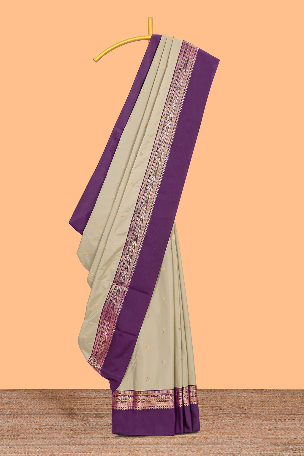 Lime cream zari motifs design semi soft silk saree with contrast zari border and blouse