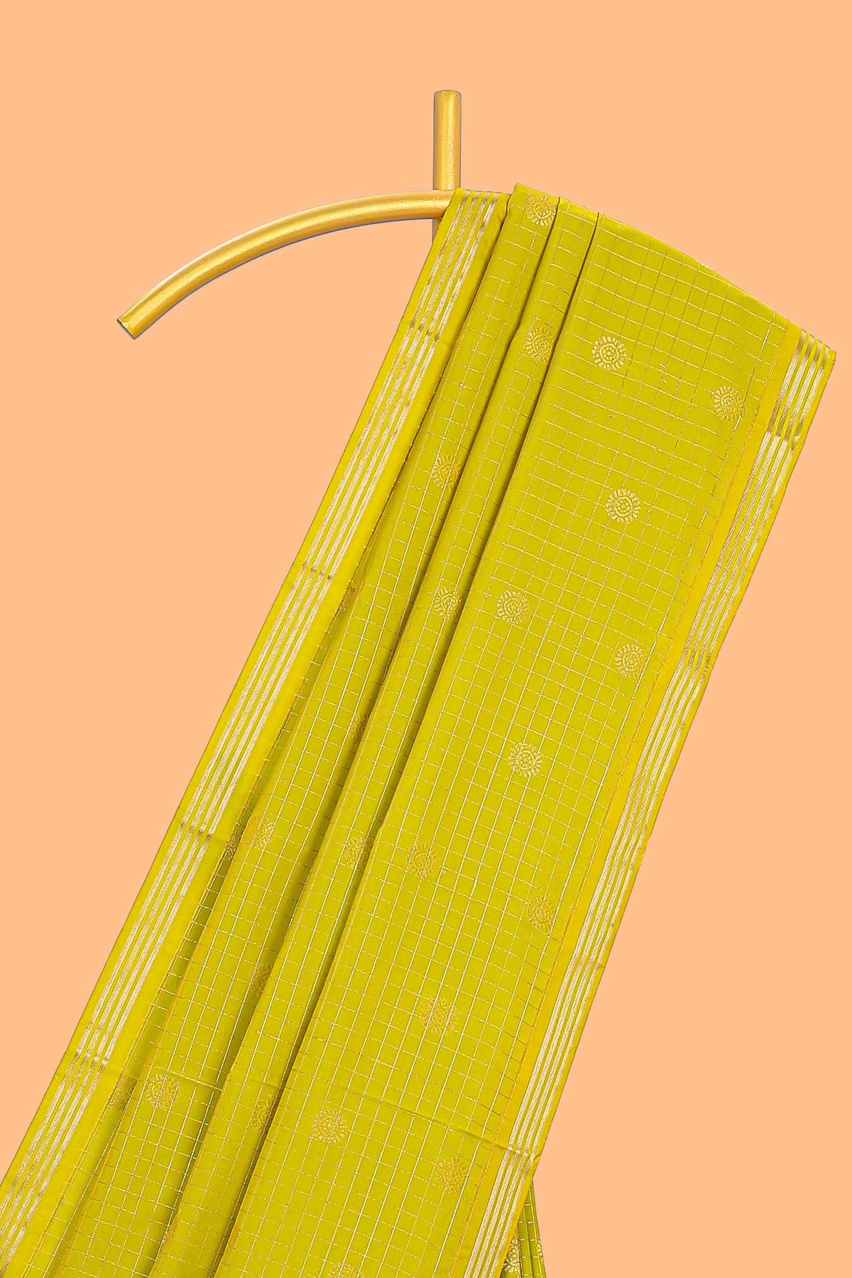 Green checked zari motifs design semi soft silk saree with self zari border and contrast blouse