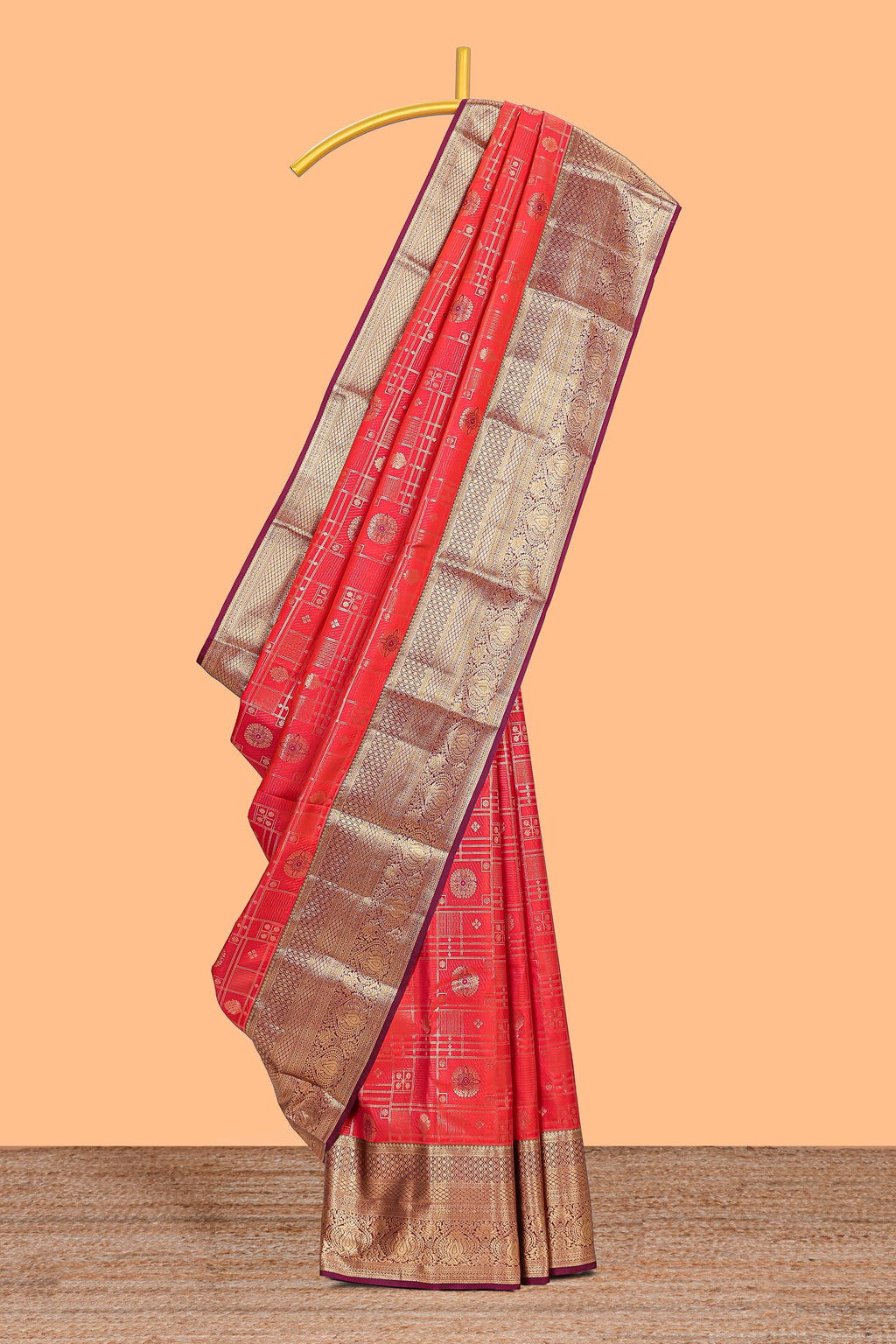 Red geometric zari design semi soft silk saree with contrast zari border and blouse