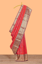 Red geometric zari design semi soft silk saree with contrast zari border and blouse