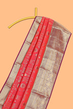 Red geometric zari design semi soft silk saree with contrast zari border and blouse
