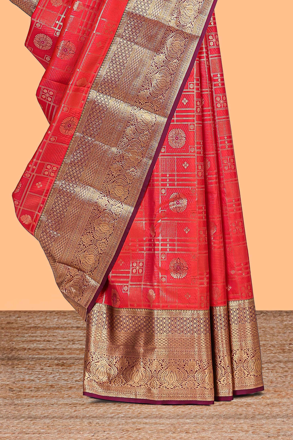 Red geometric zari design semi soft silk saree with contrast zari border and blouse