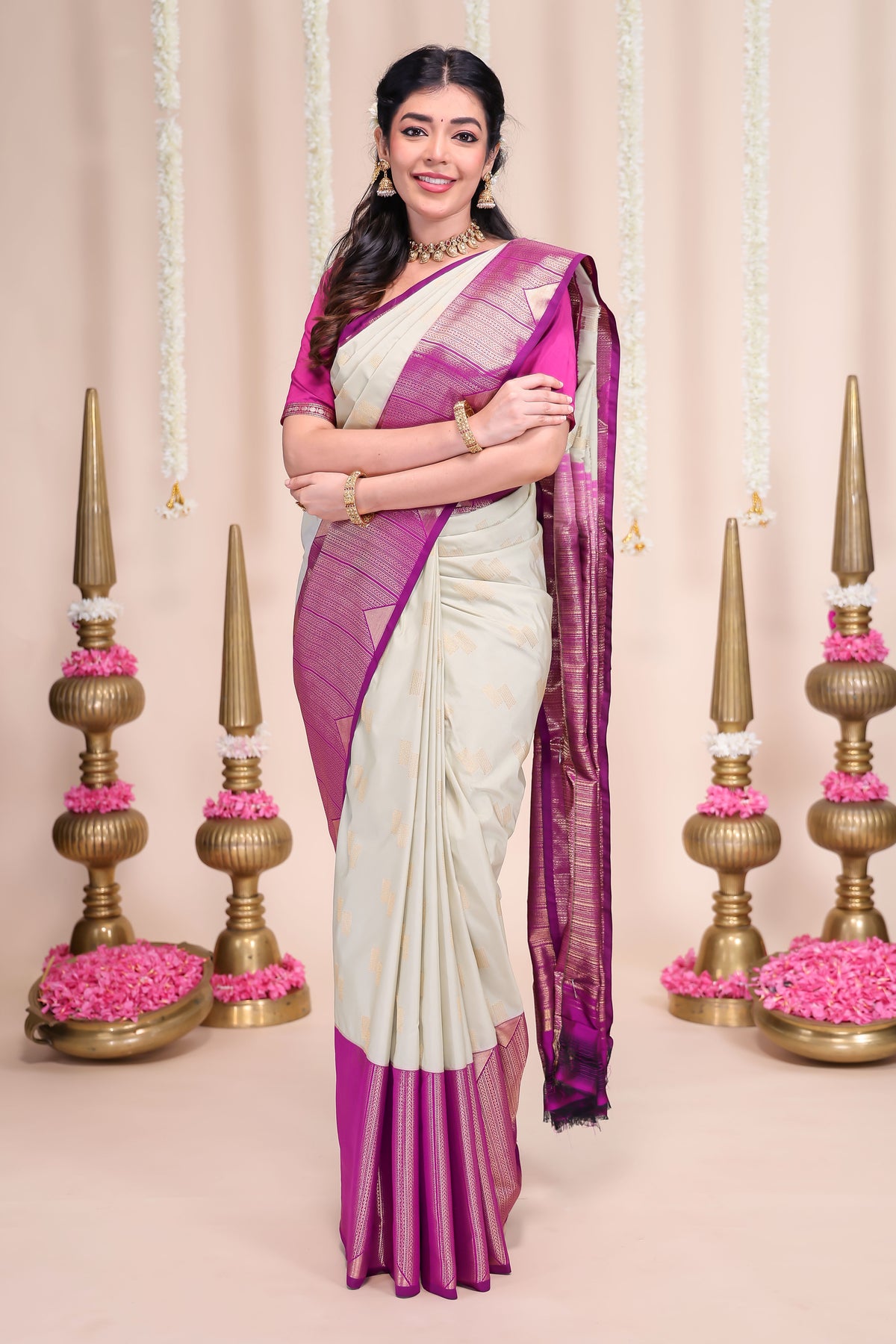Off white geometric designed zari motifs semi soft silk saree with contrast zari border and motifs blouse