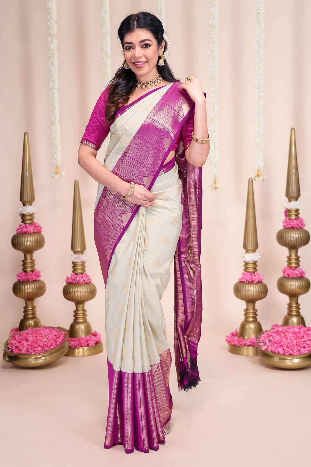 Off white geometric designed zari motifs semi soft silk saree with contrast zari border and motifs blouse