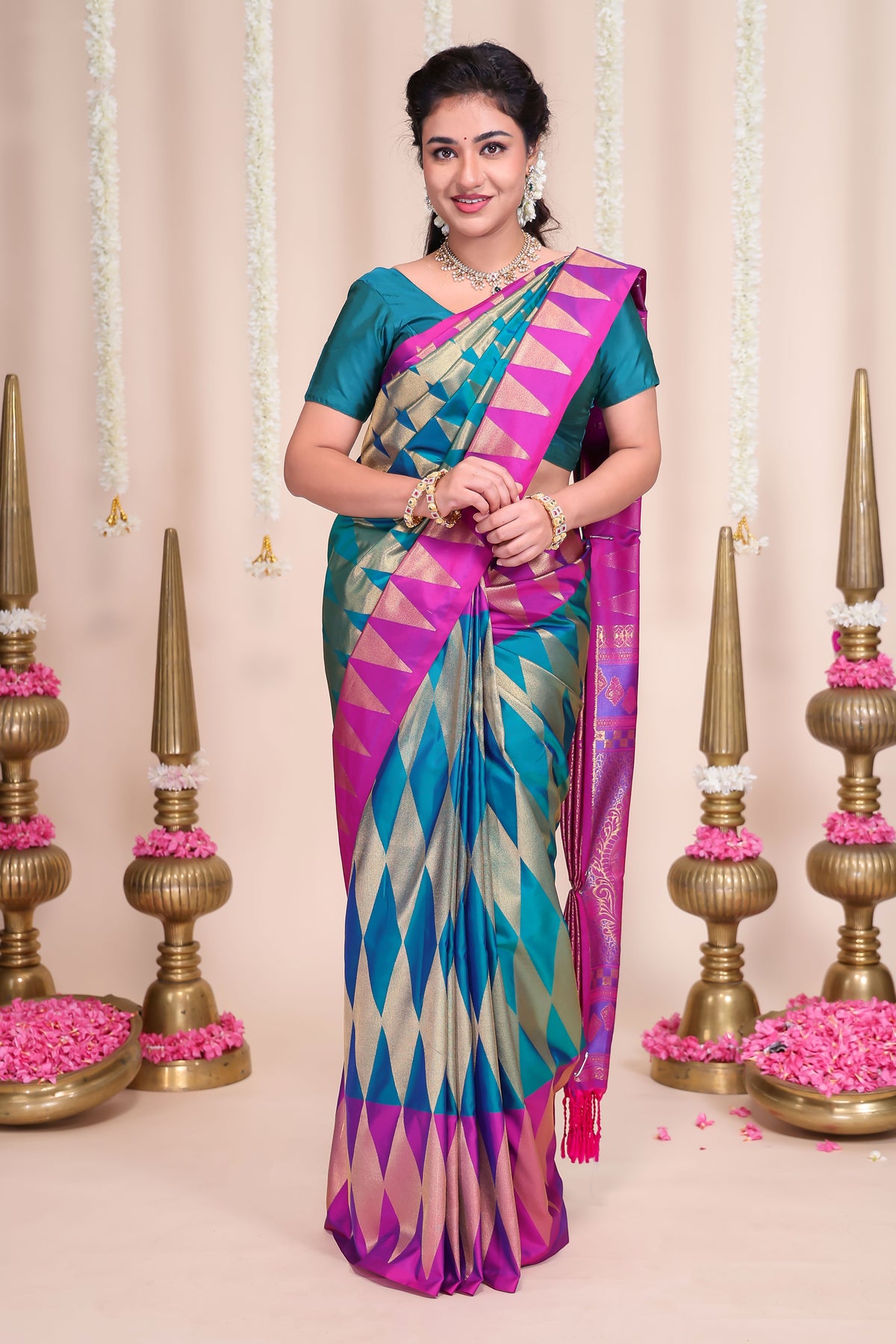 Blue geometric designed semi soft silk saree with contrast zari border and contrast blouse