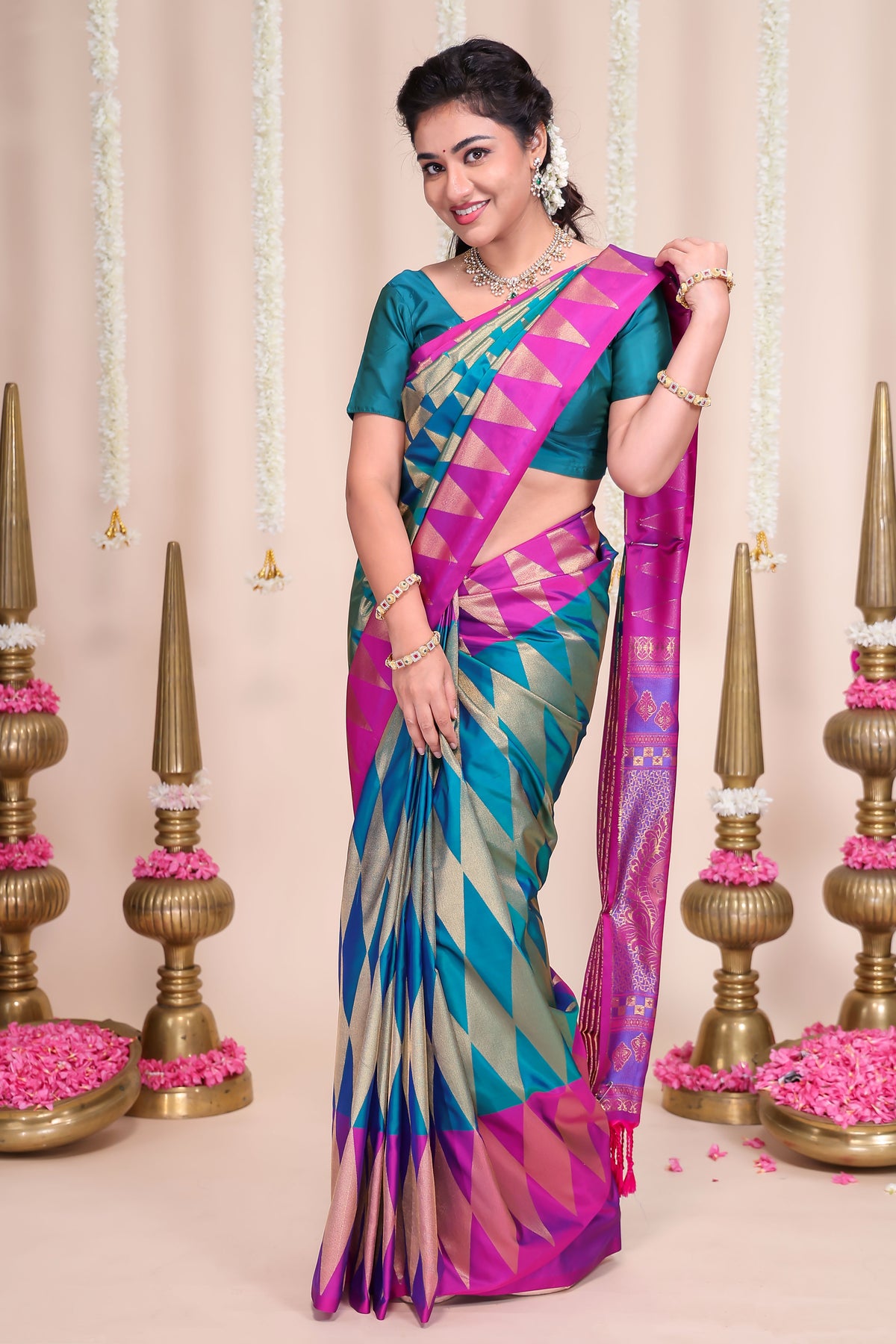 Blue geometric designed semi soft silk saree with contrast zari border and contrast blouse