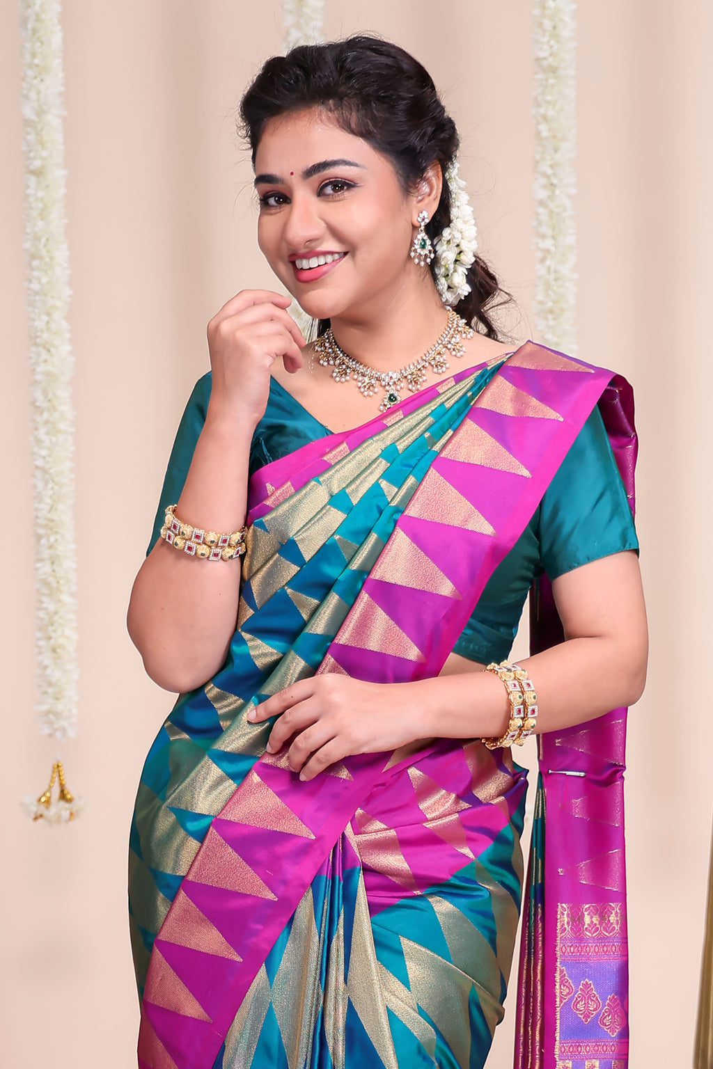 Blue geometric designed semi soft silk saree with contrast zari border and contrast blouse