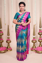 Blue geometric designed semi soft silk saree with contrast zari border and contrast blouse