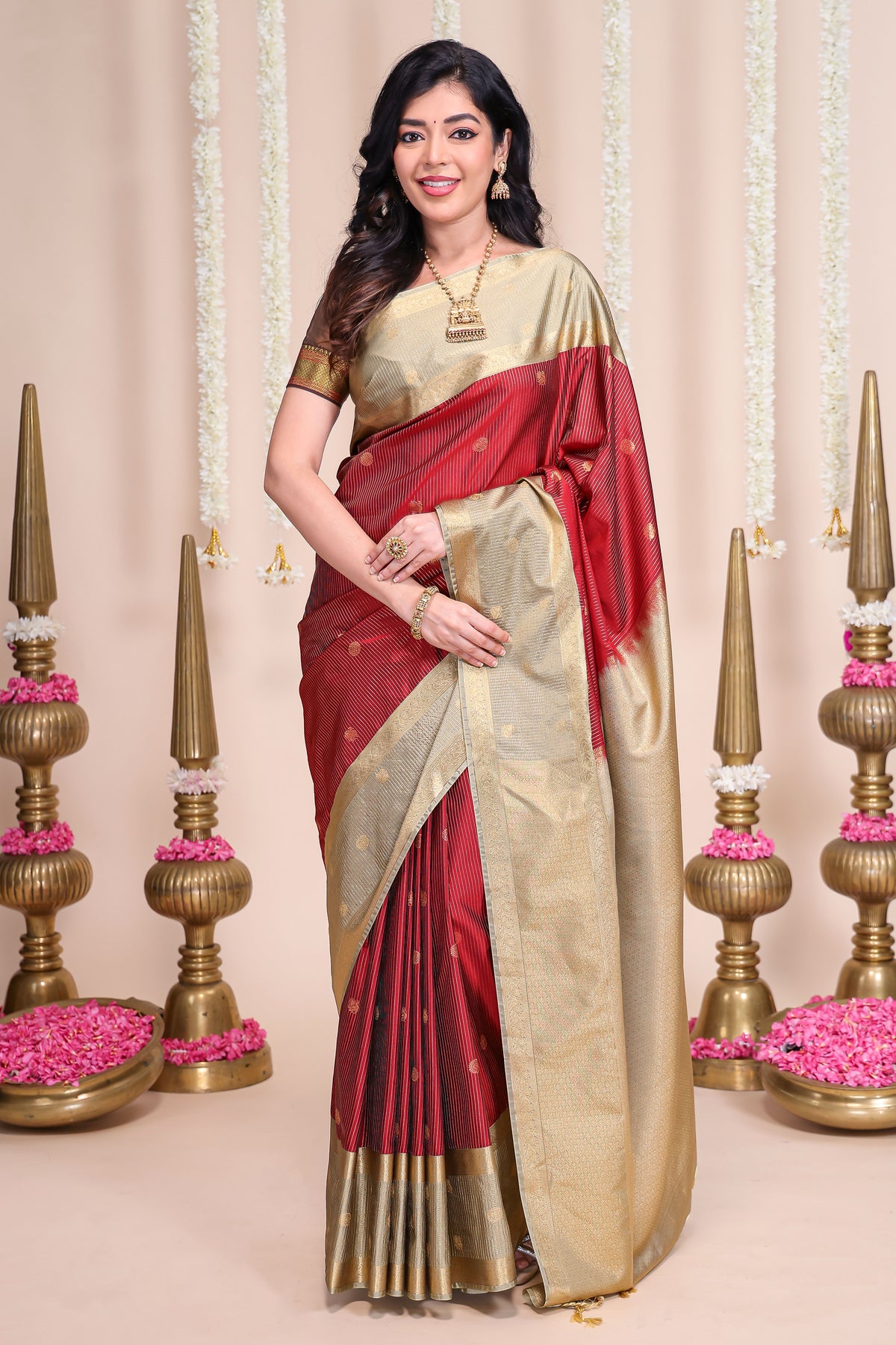 Rust shade striped butta designed semi soft silk saree with contrast zari border and contrast blouse