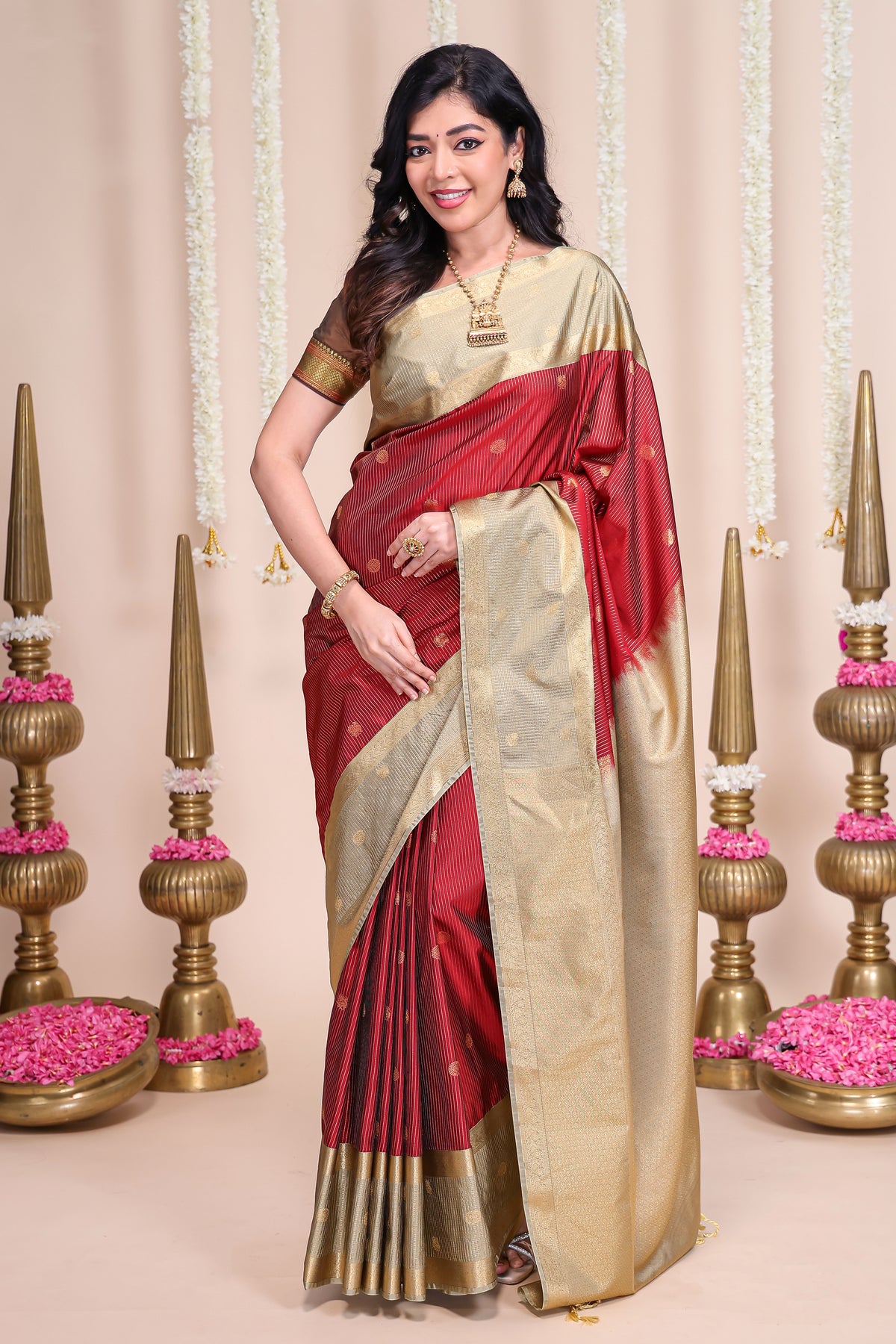 Rust shade striped butta designed semi soft silk saree with contrast zari border and contrast blouse