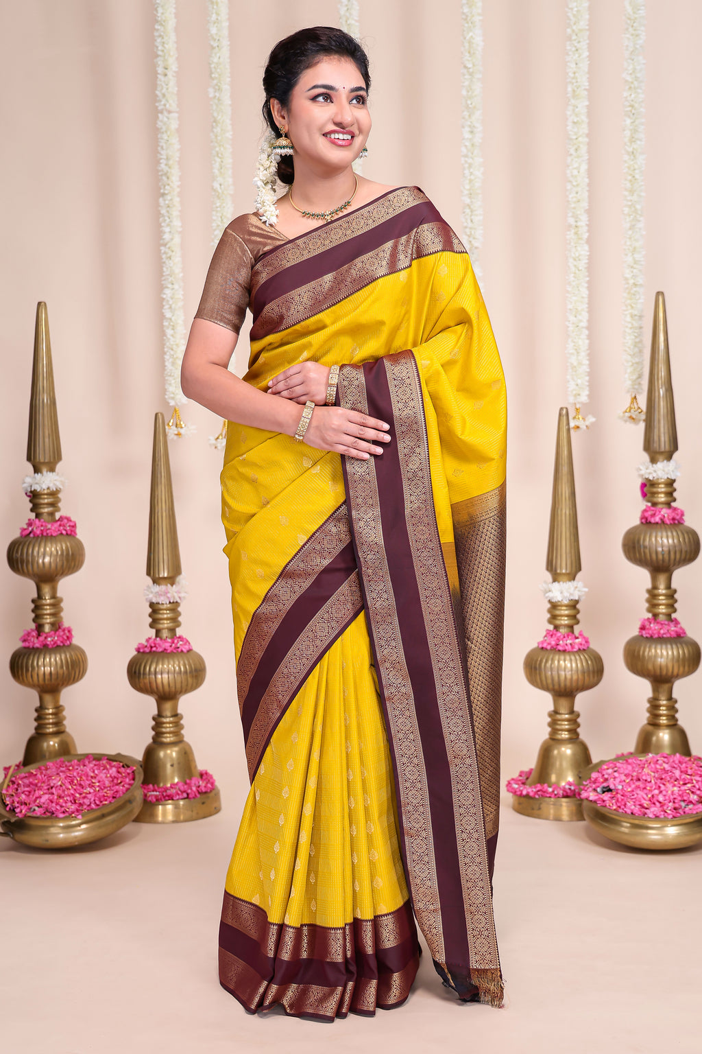 Yellow striped zari motifs designed semi soft silk saree with contrast bentex zari border and blouse