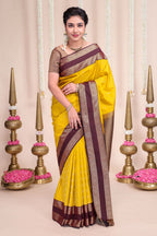 Yellow striped zari motifs designed semi soft silk saree with contrast bentex zari border and blouse