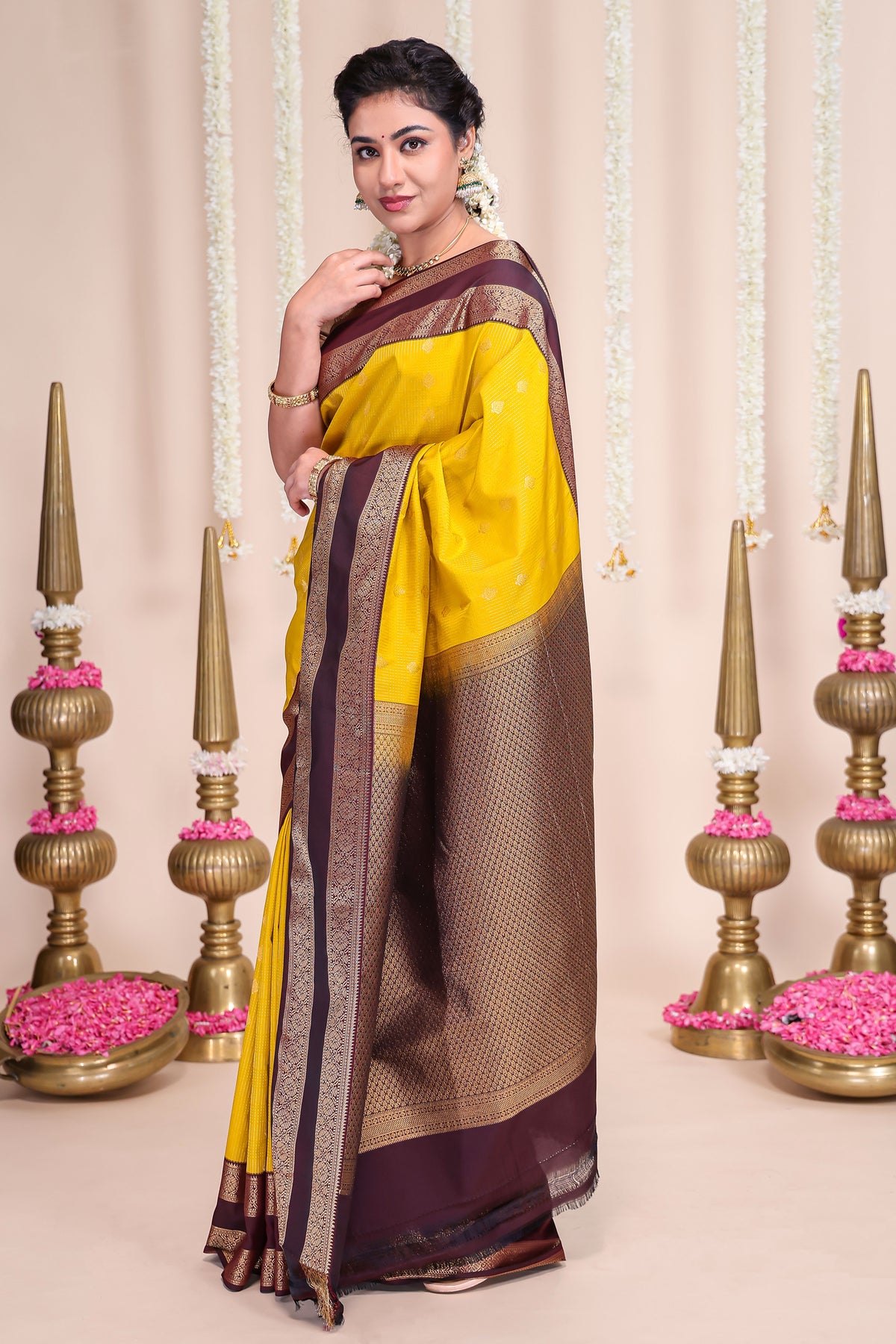 Yellow striped zari motifs designed semi soft silk saree with contrast bentex zari border and blouse