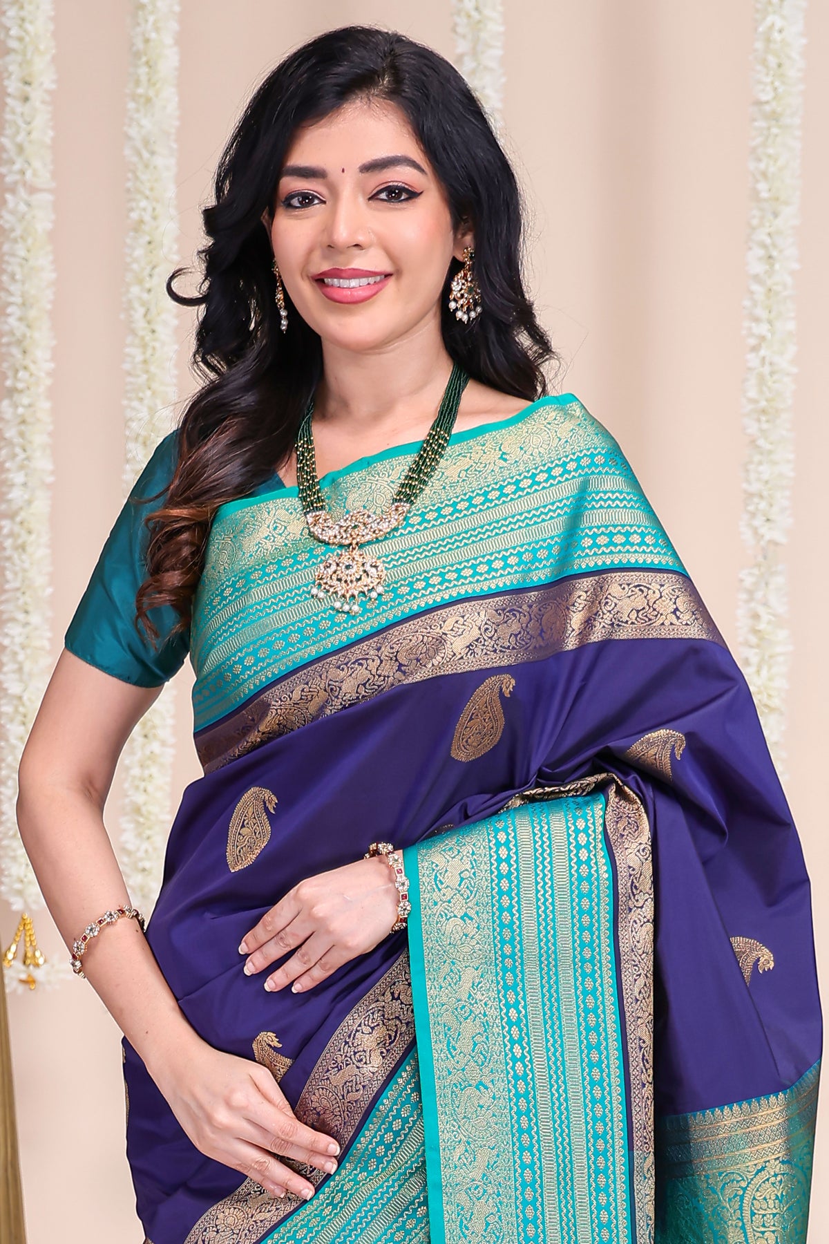 Royal blue zari motifs designed semi soft silk saree with contrast zari border and blouse