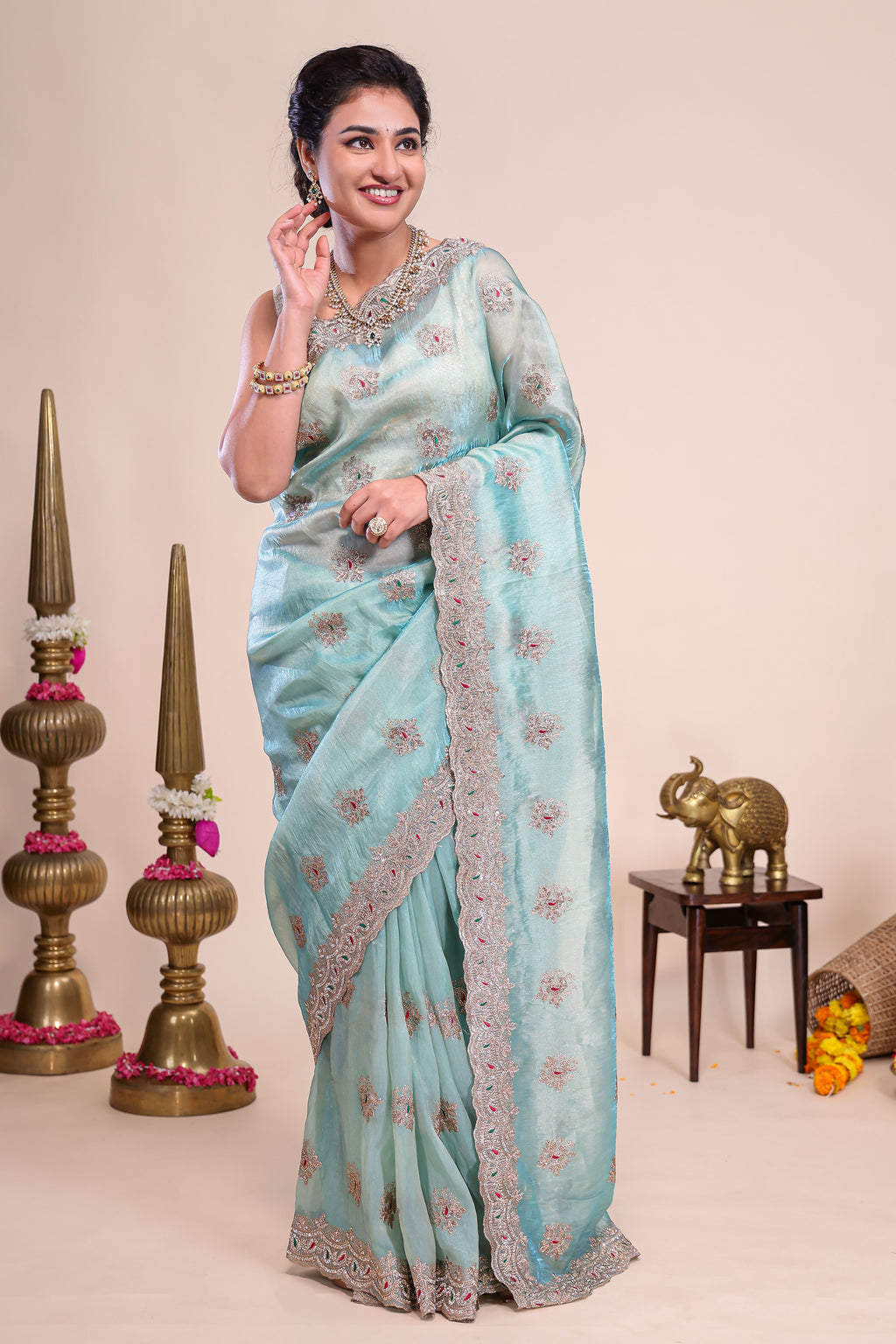 Blue floral motifs chiffon designer saree with self scallop border and matching blouse