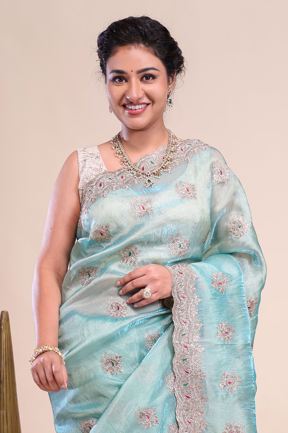 Blue floral motifs chiffon designer saree with self scallop border and matching blouse