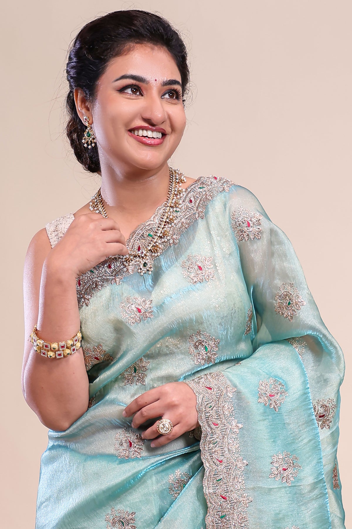Blue floral motifs chiffon designer saree with self scallop border and matching blouse