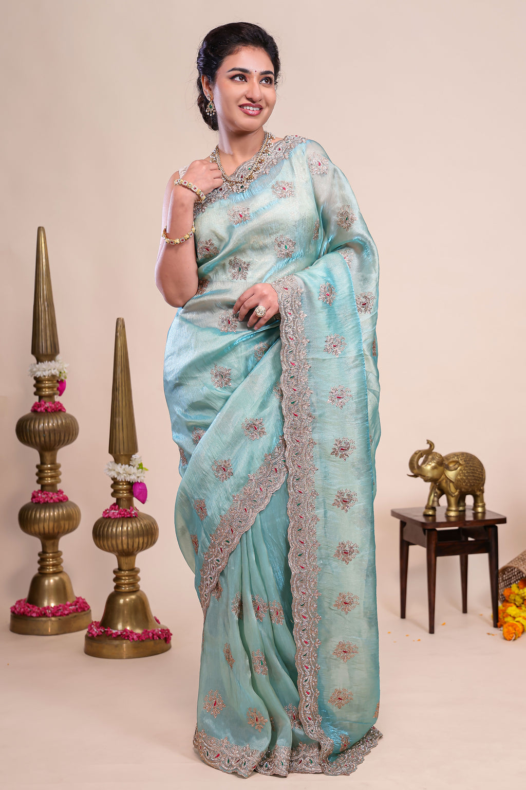 Blue floral motifs chiffon designer saree with self scallop border and matching blouse