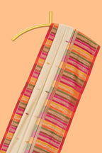Cream floral motifs semi soft silk saree with contrast multicolor striped border and blouse