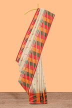 Cream butta designed semi soft silk saree with contrast multicolor geometric designed border and blouse