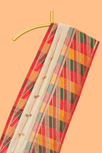 Cream butta designed semi soft silk saree with contrast multicolor geometric designed border and blouse