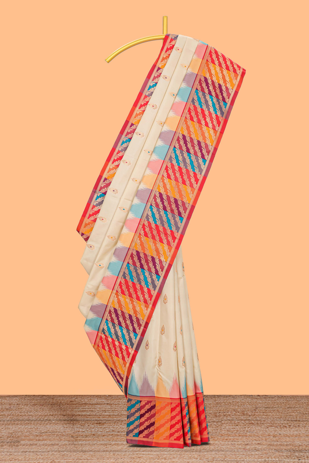 Cream zari butta designed semi soft silk saree with contrast multicolor and zari designed border and blouse