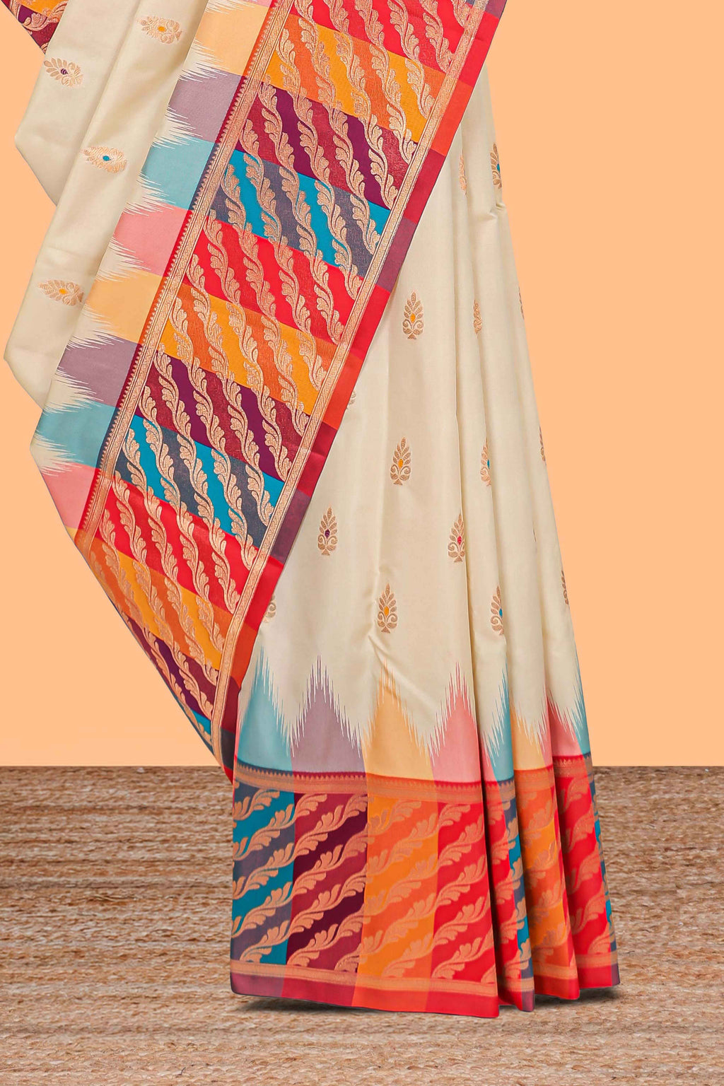 Cream zari butta designed semi soft silk saree with contrast multicolor and zari designed border and blouse