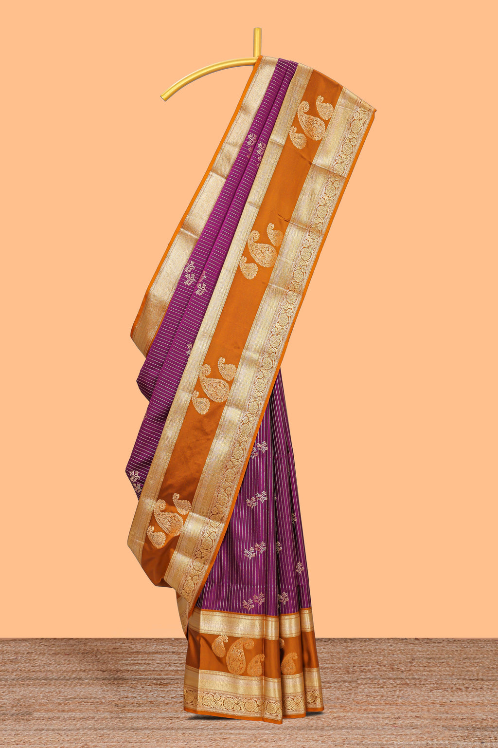 Magenta-purple striped and leafy motifs semi soft silk saree with contrast zari manga motifs border and blouse