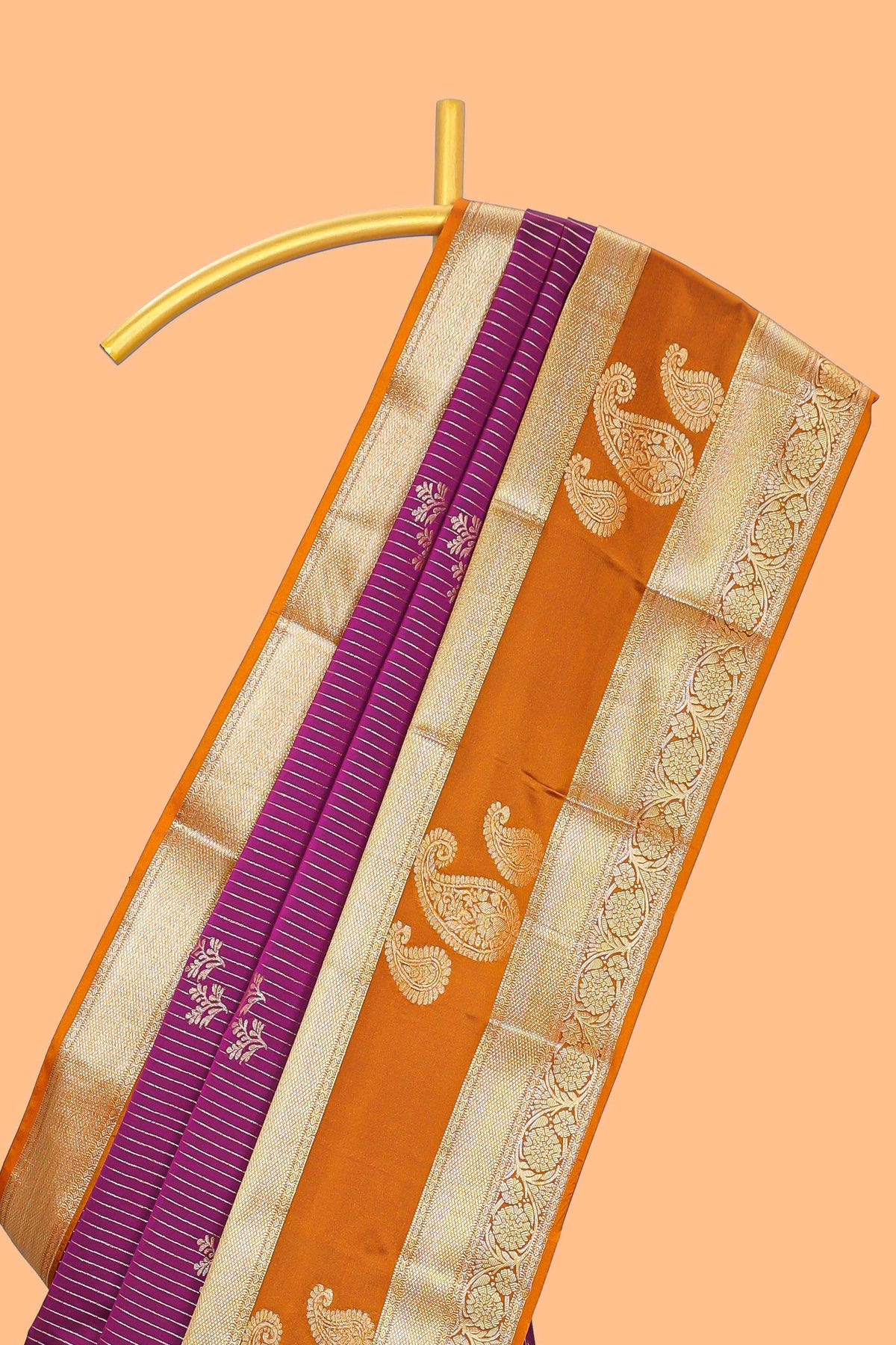 Magenta-purple striped and leafy motifs semi soft silk saree with contrast zari manga motifs border and blouse