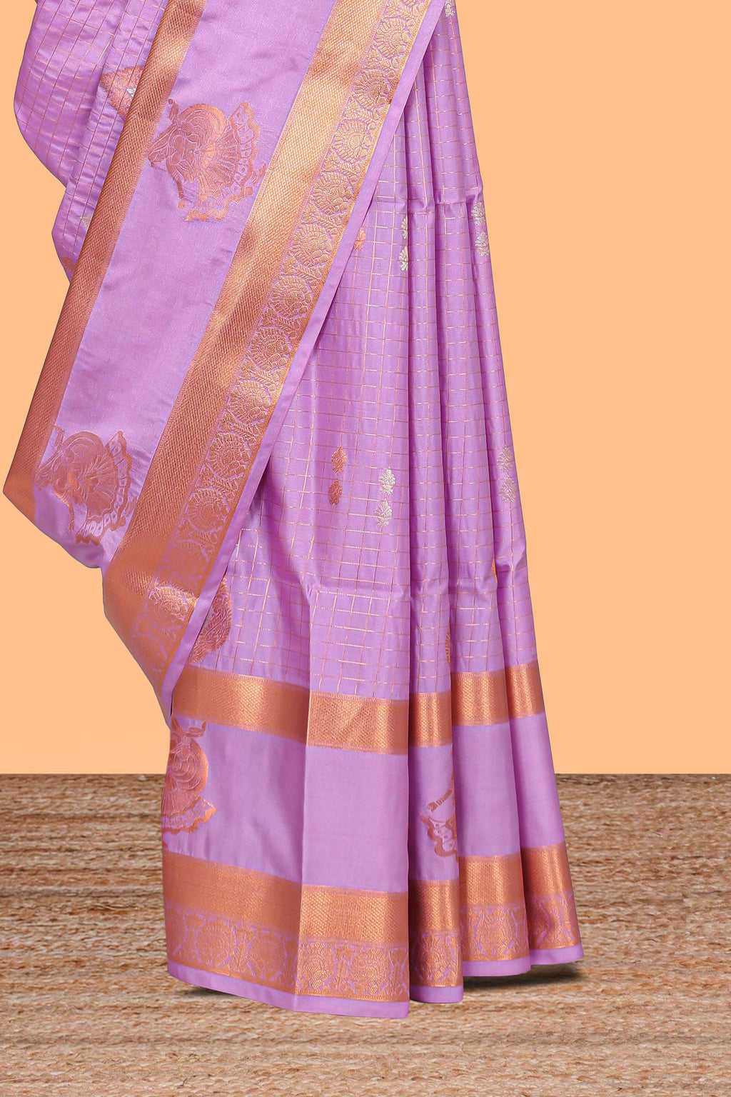 Lilac-lavender checked and butta designed semi soft silk saree with self zari pavai motifs border and blouse