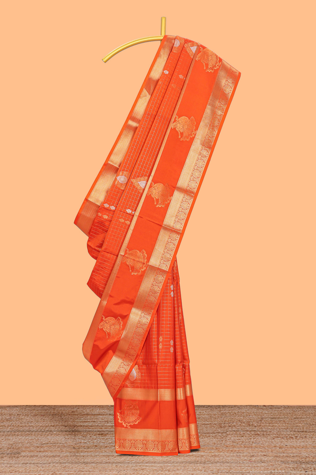Bright orange checked and butta designed semi soft silk saree with self zari pavai motifs border and blouse