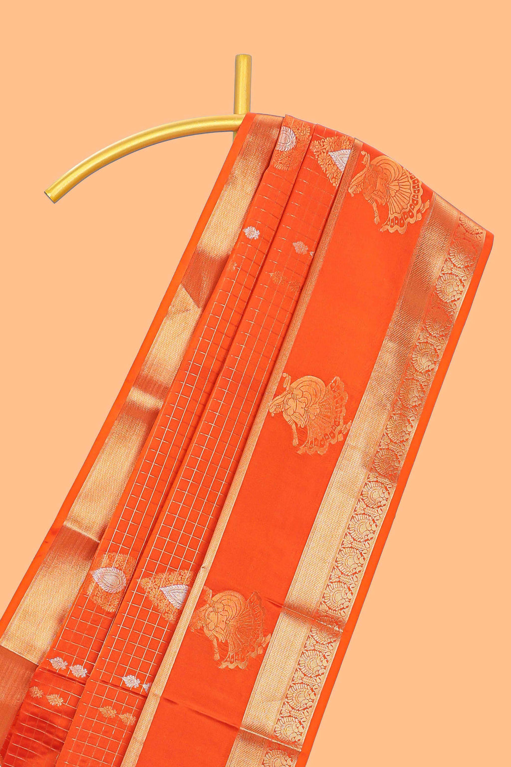 Bright orange checked and butta designed semi soft silk saree with self zari pavai motifs border and blouse