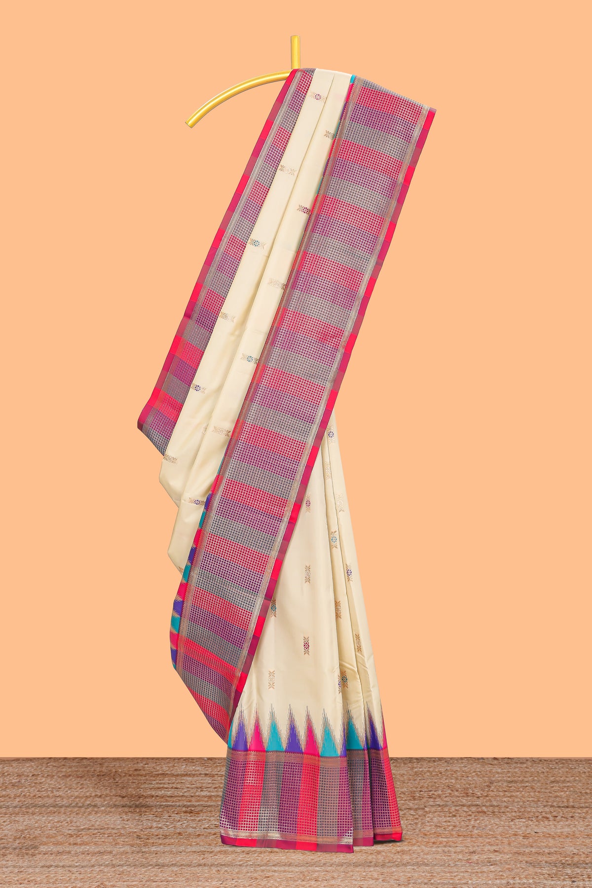 Cream geometric butta motifs semi soft silk saree with contrast multicolor checked border and blouse