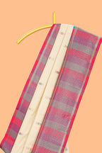Cream geometric butta motifs semi soft silk saree with contrast multicolor checked border and blouse
