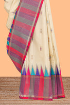 Cream geometric butta motifs semi soft silk saree with contrast multicolor checked border and blouse