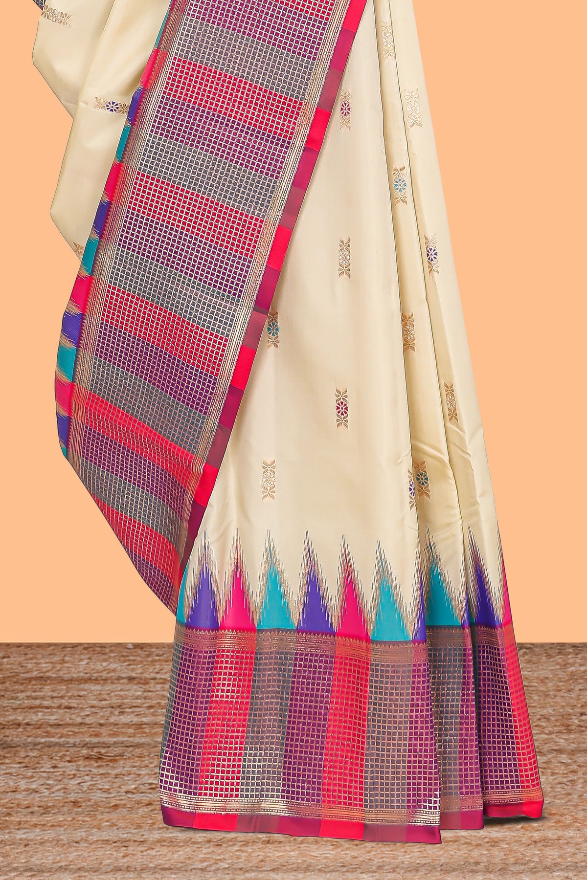 Cream geometric butta motifs semi soft silk saree with contrast multicolor checked border and blouse