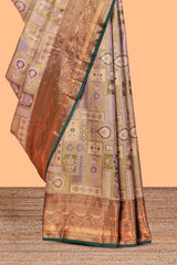 Pastel Sage Green Tissue Silk Saree with Antique Gold Zari Weaving and Dark Green Contrast Border and Contrast Blouse