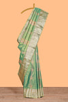 Pastel Green Tissue Silk Saree with Zari Weaving and PastelFloral Accents along with Matching Blouse