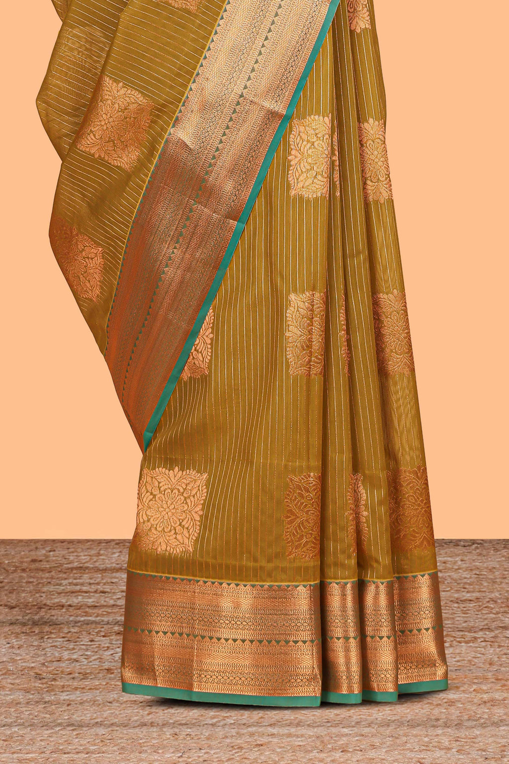 Antique Olive Green Tissue Silk Saree with Rich Gold Zari Weaving and Teal Green Contrast Border along with Contrast Blouse