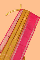 Turmeric Yellow Color Tissue Silk Saree withZari Checksand Buttas Weaving Body and Contrast Border along with Contrast Blouse