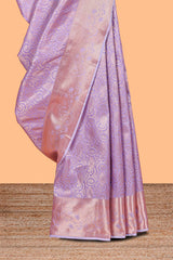 Lavender Color Tissue Silk Saree withZari Weaving Body and Contrast Border along with Matching Blouse