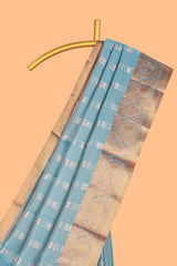Elegant Turquoise Blue Tissue Silk Saree with Antique Gold Woven Motifs and Rich Zari Border along with Contrast Blouse