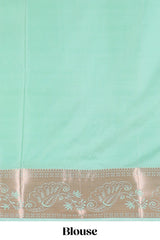 Pastel Green Color Tissue Silk Saree withZari Weaving Body and Contrast Border along with Matching Blouse