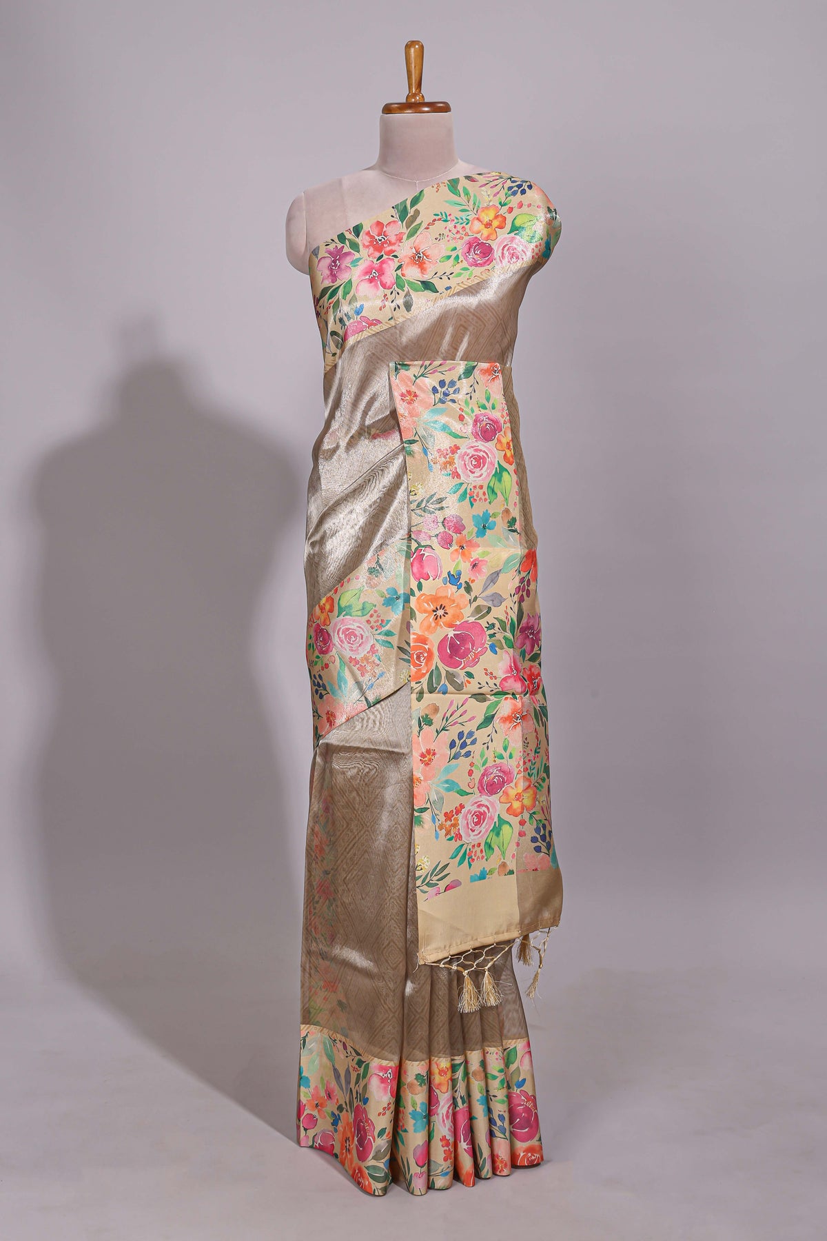 Brown geometric design tissue saree with contrast floral print border and printed blouse